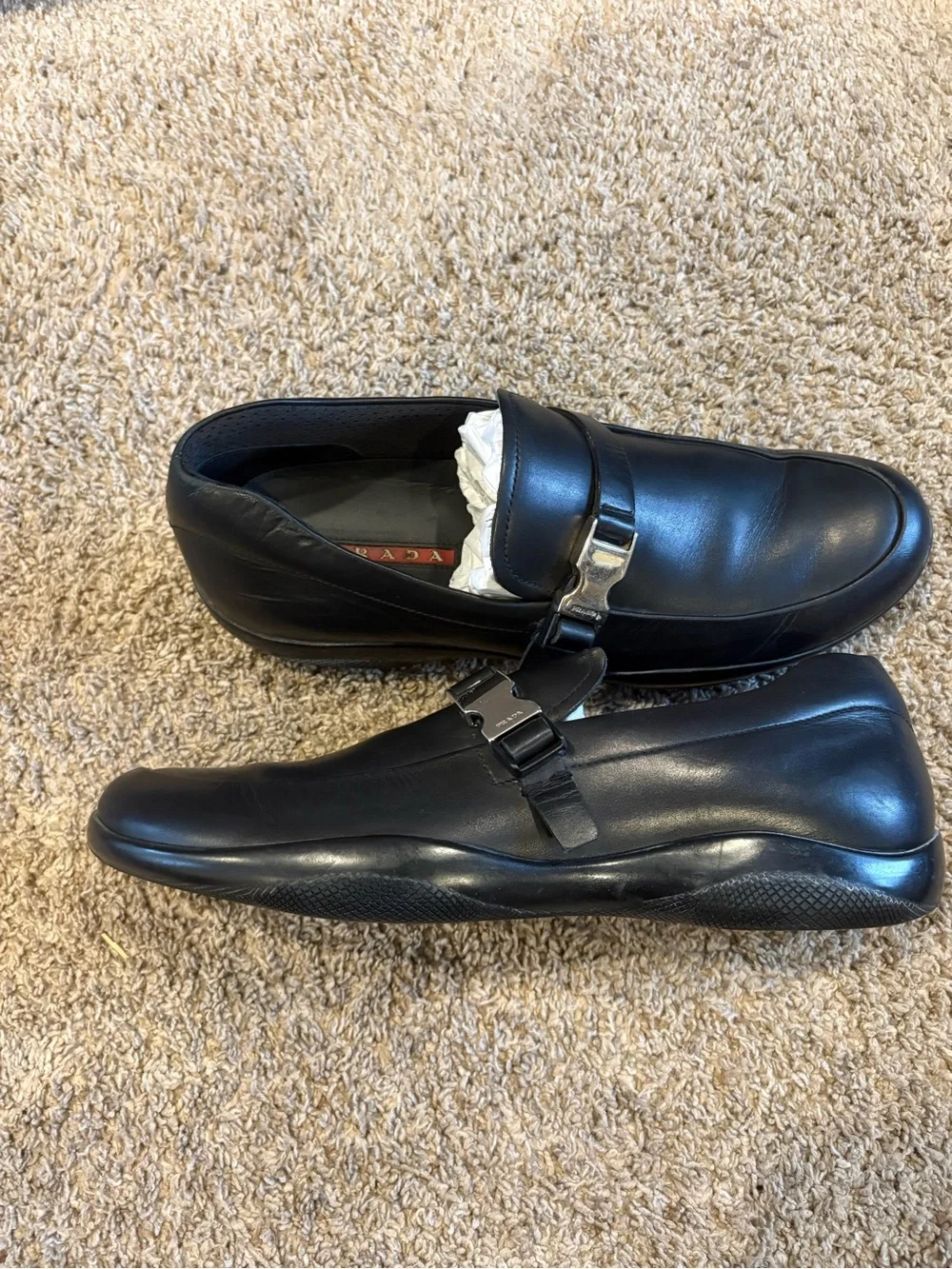 Prada Linea Rossa Black Leather Slip-On Loafers with Metal Buckle